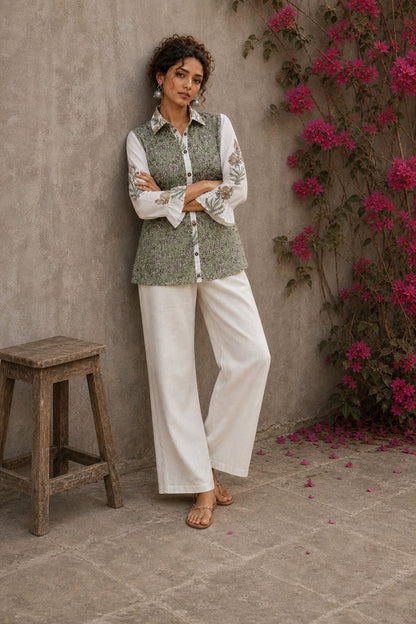 Off-white cotton shirt with pastel green Jaipur jaal print body and contrasting motif-printed sleeves.