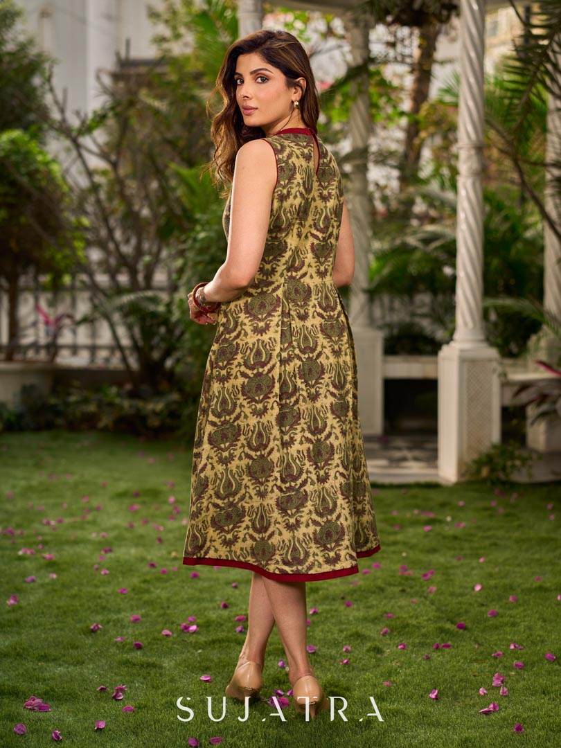 Graceful natural-printed halter dress elevated with subtle maroon highlights.