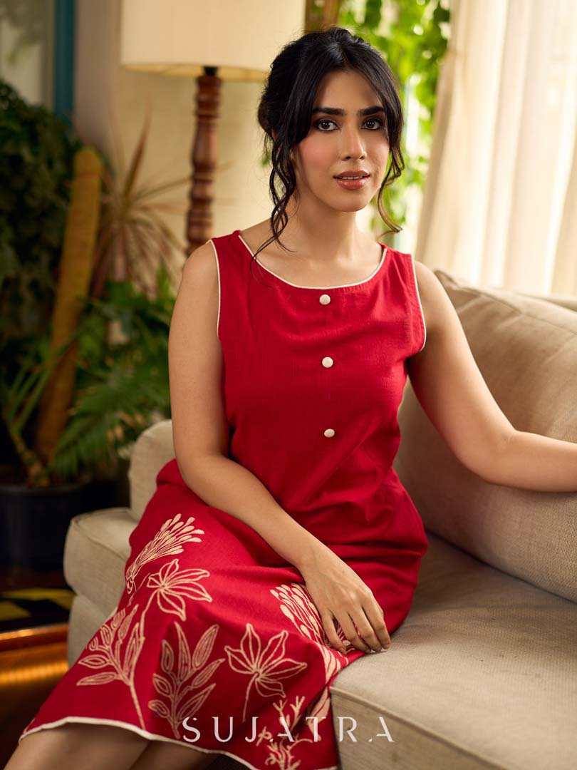 Dussehra Sale — Vibrant red sleeveless dress with a bold off-white floral hand block print at the hem and clean off-white edging for a striking, handcrafted-inspired finish.