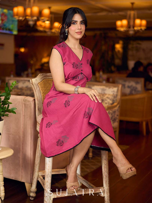 Rich wine drop-shoulder dress with black and grey hand block printed floral motifs, a softly gathered yoke, black pearl embellishments, and bold black accents for a striking artisanal look.