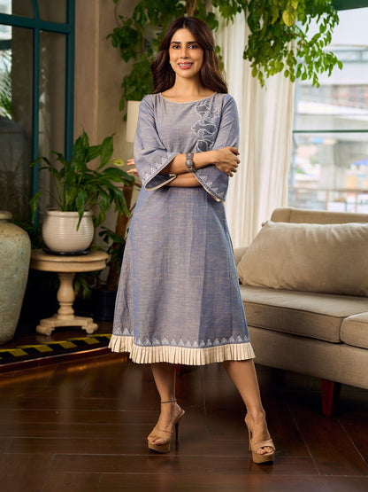 Two-tone handloom cotton dress with delicately painted Madhubani fish motifs and pleated hem.
