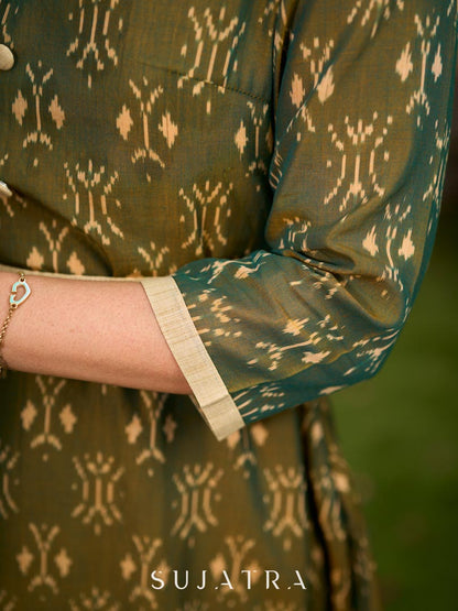 Statement olive green two-tone Ikat dress elevated with cream and gold accents, a structured belt for definition, and a subtle left-front slit.
