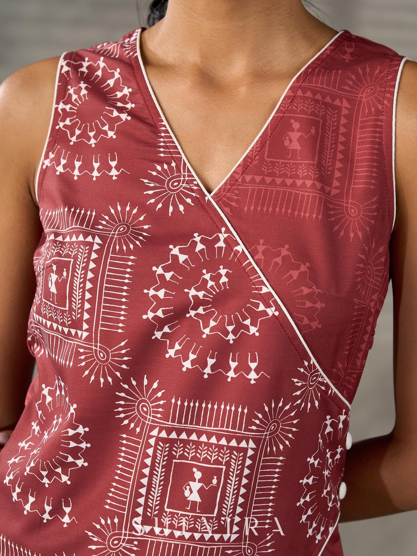 Terracotta warli printed overlap dress with off white accents