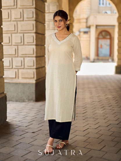 Pristine Off-White Cotton Flex Straight Kurta Featuring Subtle Monochrome Embroidery on Neckline & Sleeve Cuffs