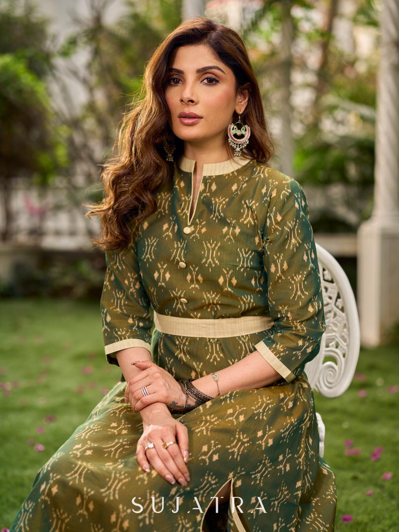 Statement olive green two-tone Ikat dress elevated with cream and gold accents, a structured belt for definition, and a subtle left-front slit.