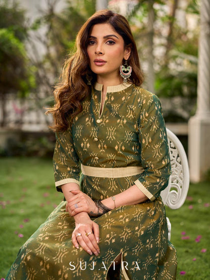 Statement olive green two-tone Ikat dress elevated with cream and gold accents, a structured belt for definition, and a subtle left-front slit.