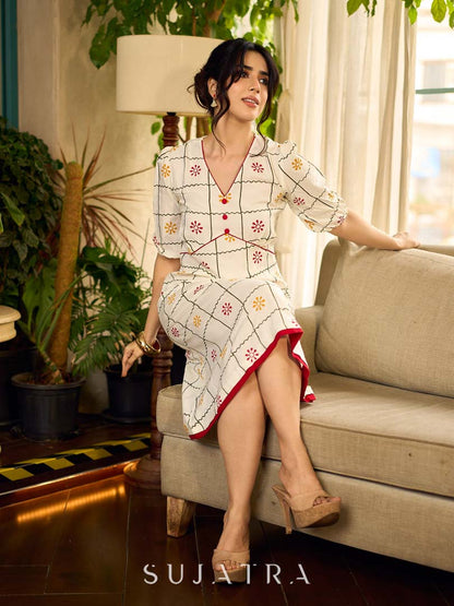 Soft off-white block printed rayon dress with intricate all-over hand block printed checks and florals, a gently gathered yoke, and rich red accents for a refined, elegant everyday look.