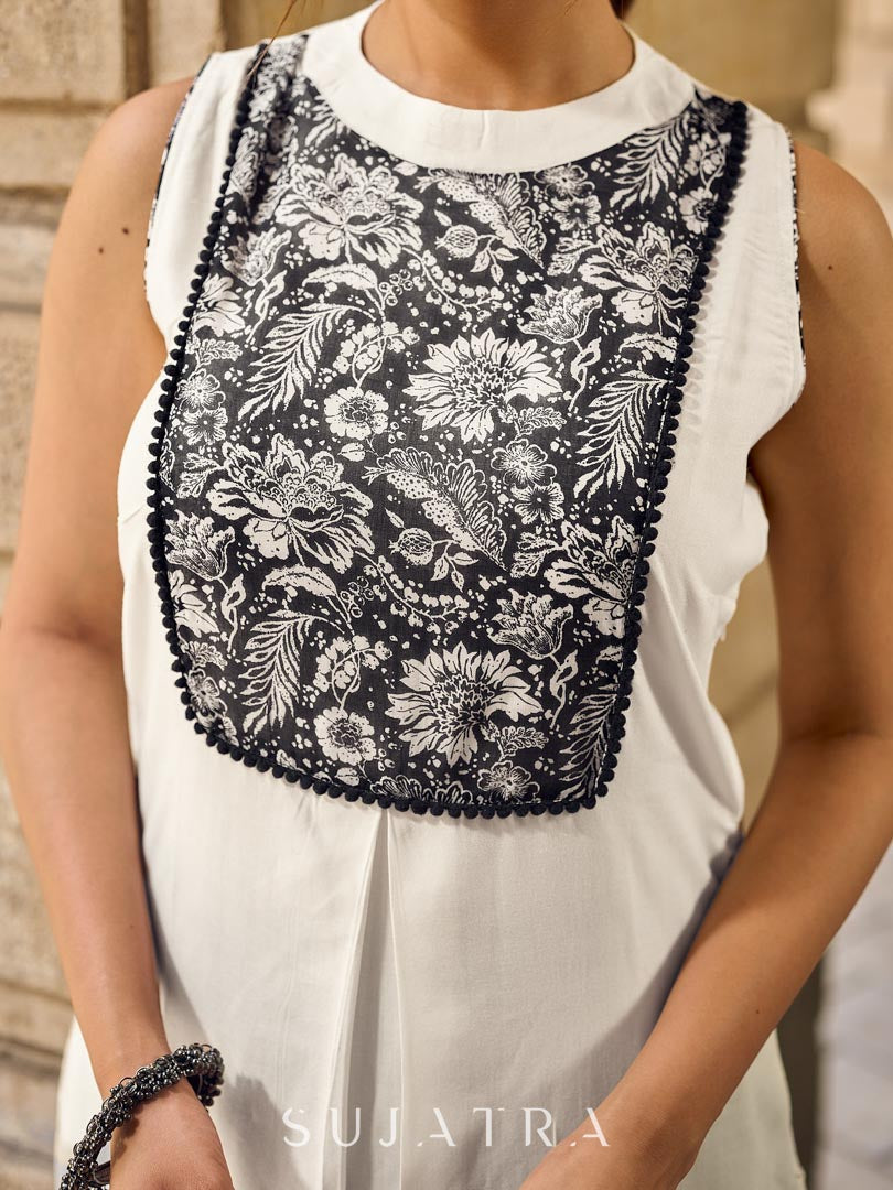 Elegant Off-White Rayon Sleeveless Kurta with Contrast Black Floral Embroidered Yoke Panel
