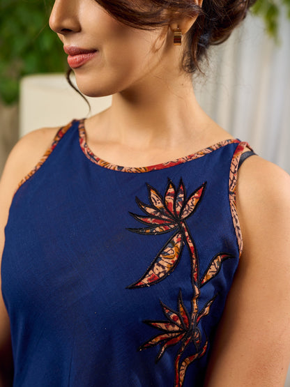 Modern navy dress enhanced by delicate, artistic Kalamkari side-applique work.