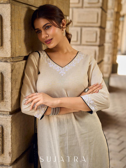Pristine Off-White Cotton Flex Straight Kurta Featuring Subtle Monochrome Embroidery on Neckline & Sleeve Cuffs