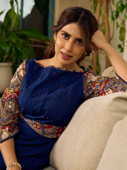 Navy Blue Artisanal Kalamkari prints enhanced with statement sleeves and a waist-defining knotted Kalamkari belt.