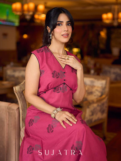 Rich wine drop-shoulder dress with black and grey hand block printed floral motifs, a softly gathered yoke, black pearl embellishments, and bold black accents for a striking artisanal look.