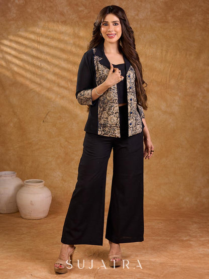 Elegant black and navy Kalamkari jacket featuring a notch collar and subtle navy accents, creating a graceful, tailored silhouette suited for polished corporate wear.