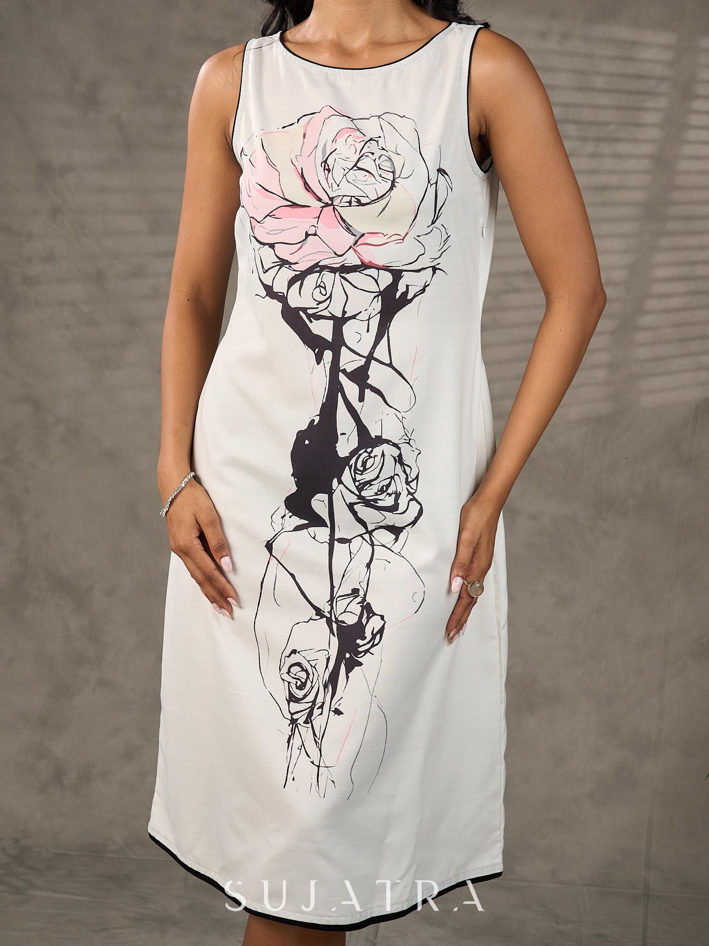 Timeless monochrome dress with statement flower print.