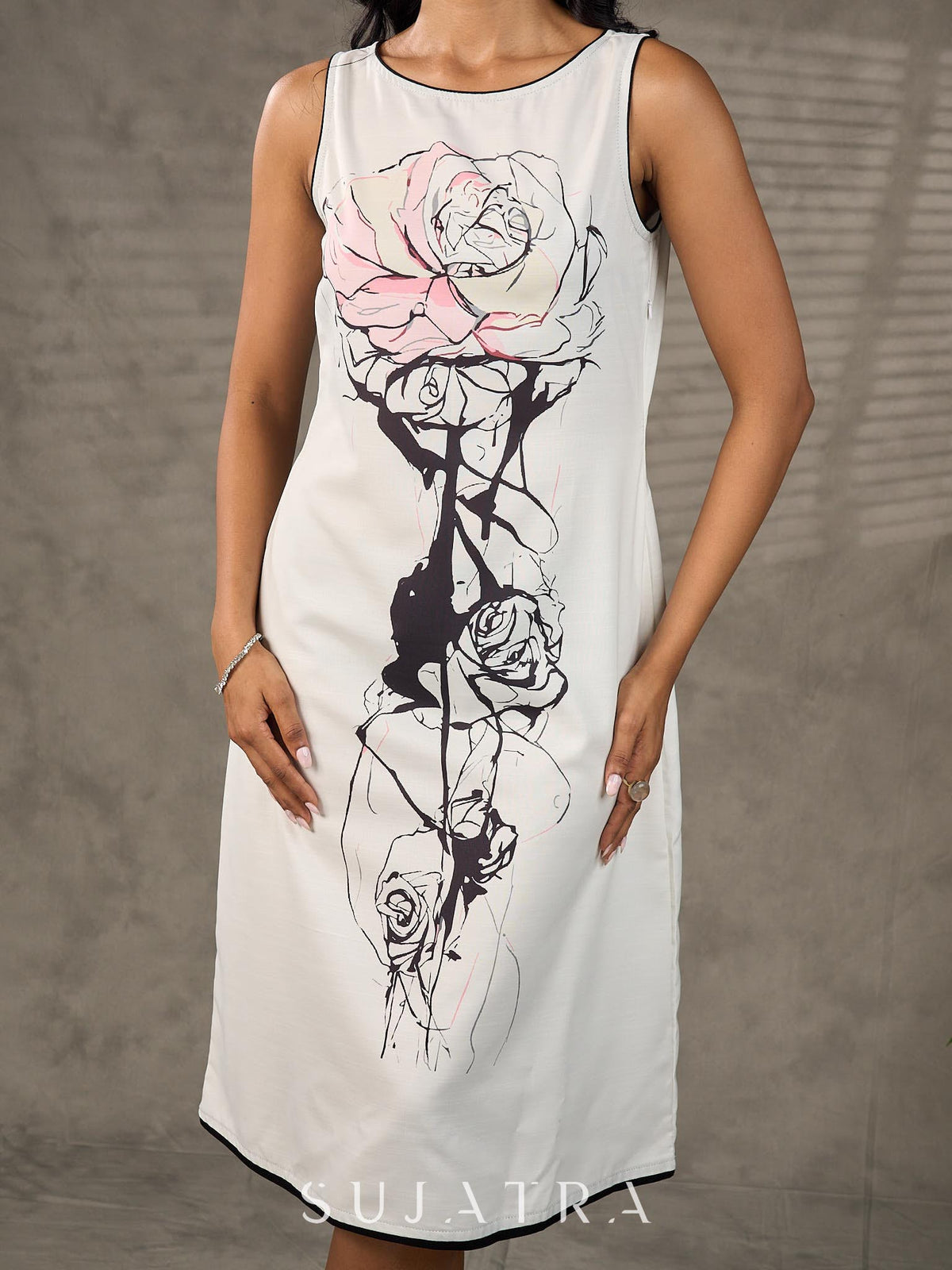 Timeless monochrome dress with statement flower print.