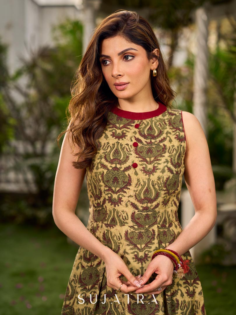 Graceful natural-printed halter dress elevated with subtle maroon highlights.