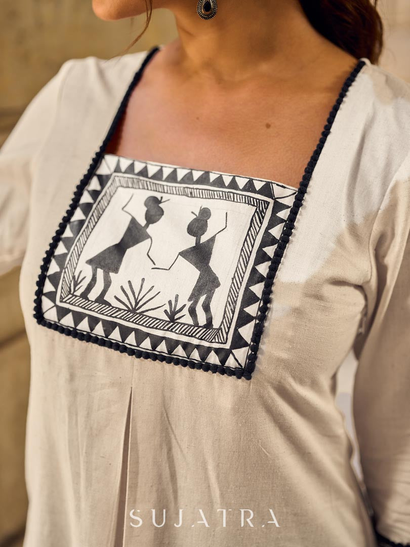 Timeless Off-White Cotton Kurta Featuring Hand Painted Warli Folk Art Yoke & Cuff Band