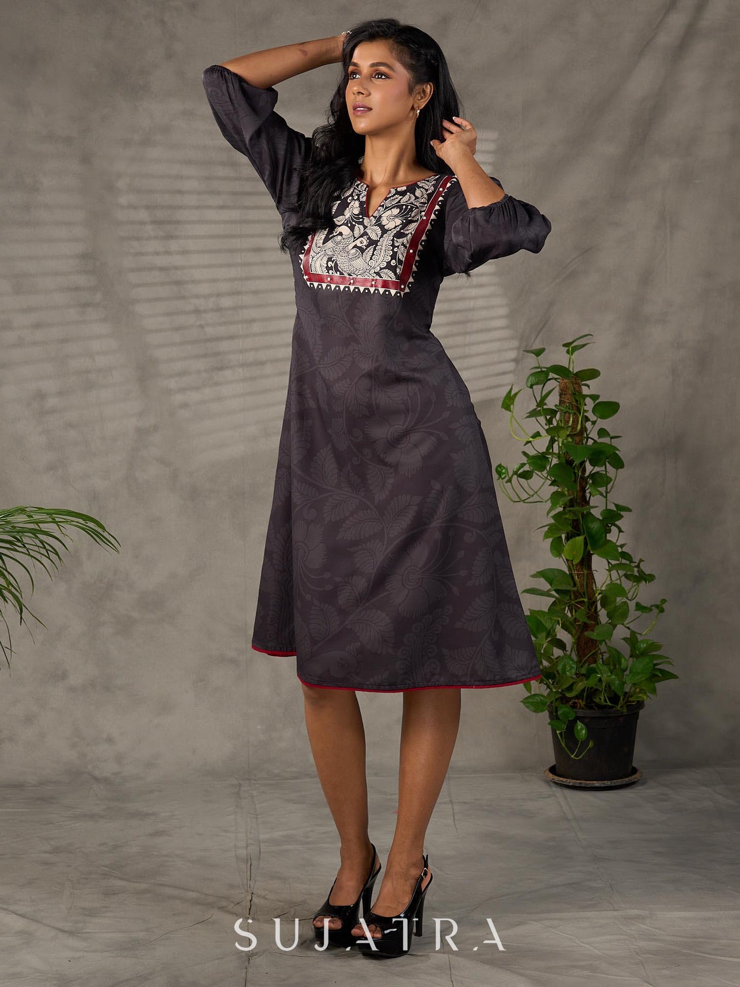 Black Kalamkari-inspired printed dress with maroon accents and pearl embellishments