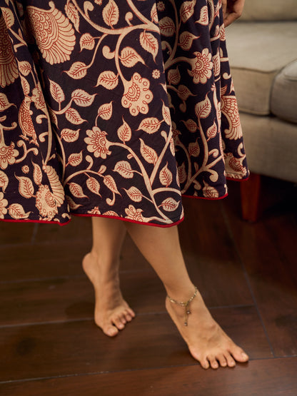 Black and Maroon Elegant Kalamkari Dress with pintuck detailing and flowing bias-cut silhouette.