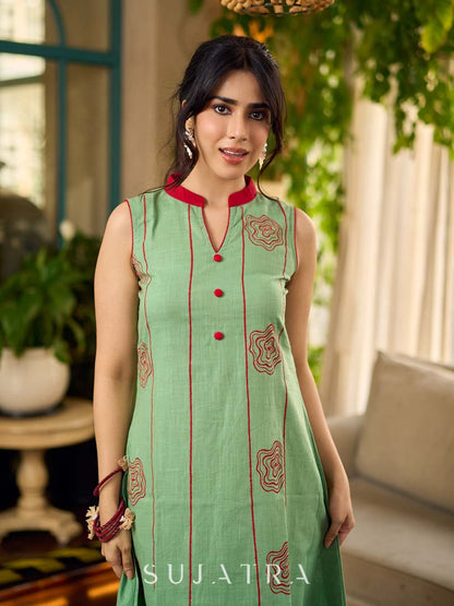 Pista sleeveless block printed dress with red abstract motif panels, a contrasting red collar, and accents for a fresh, artisanal, contemporary look.