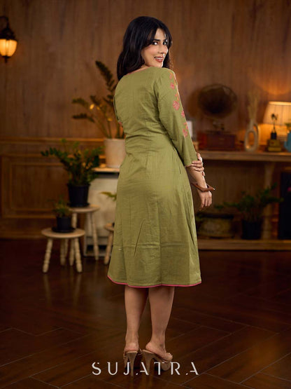 Muted pista hand block printed dress with delicate cascading hand block floral motifs and soft pink accents for a graceful, elegant, and refreshing everyday look.