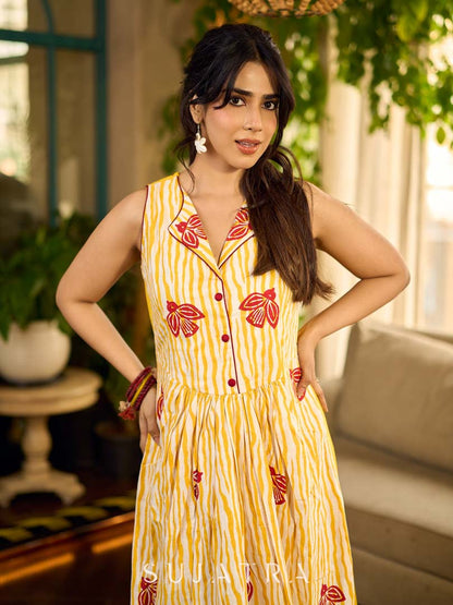 Yellow and white zebra-striped hand block printed sleeveless vintage luxe dress with maroon bird motifs and matching accents for a bold, elegant statement look.