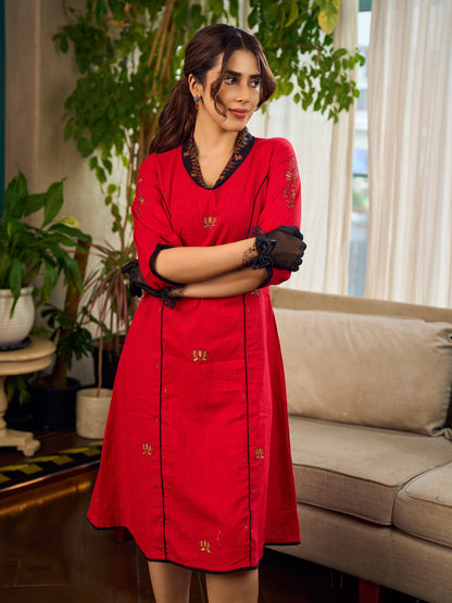 Elegant red dress featuring delicate, hand-painted Madhubani lotus motif detailing.