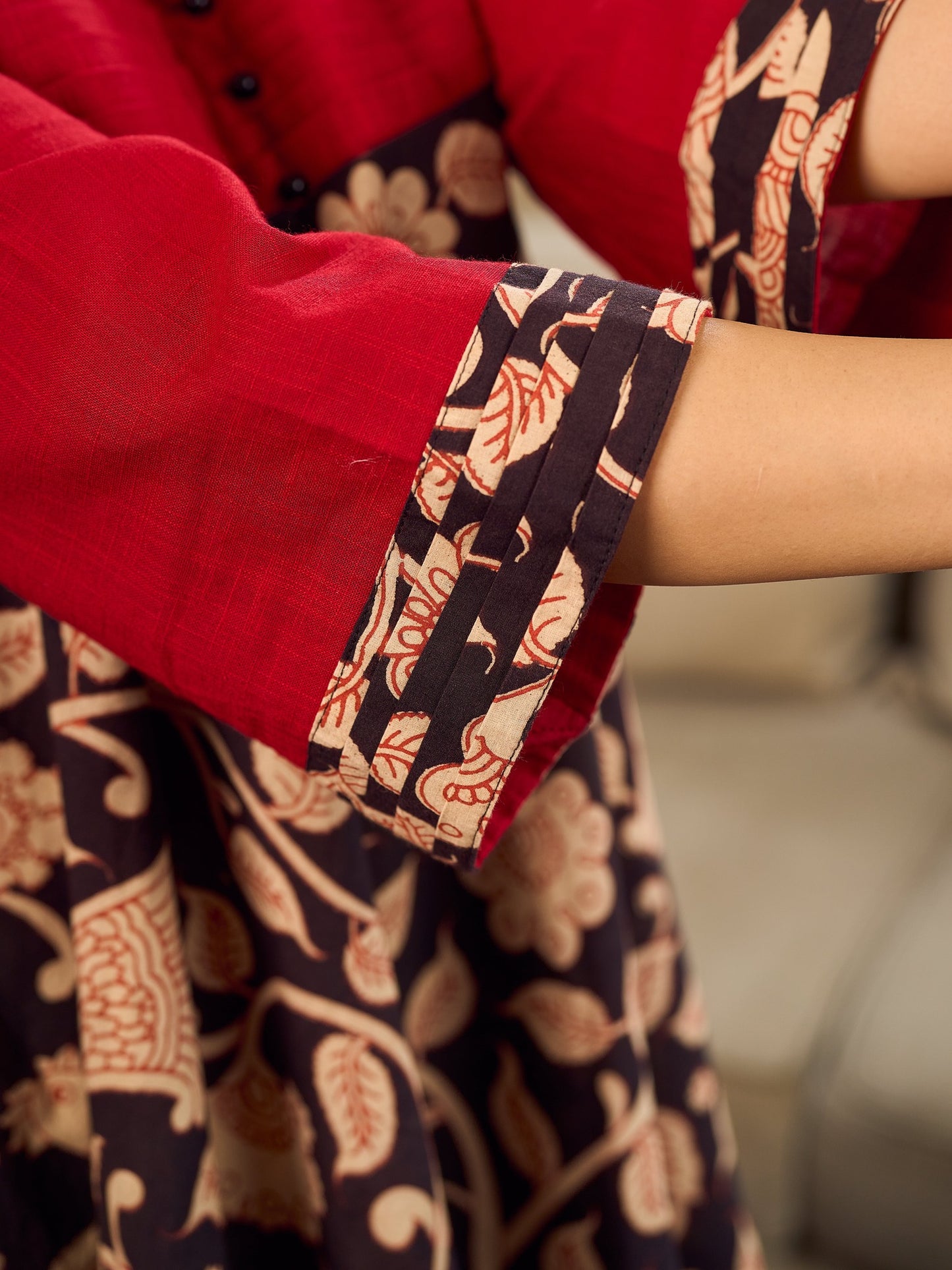 Black and Maroon Elegant Kalamkari Dress with pintuck detailing and flowing bias-cut silhouette.