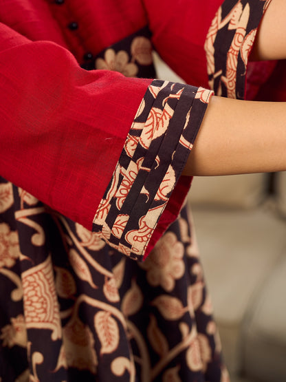 Black and Maroon Elegant Kalamkari Dress with pintuck detailing and flowing bias-cut silhouette.