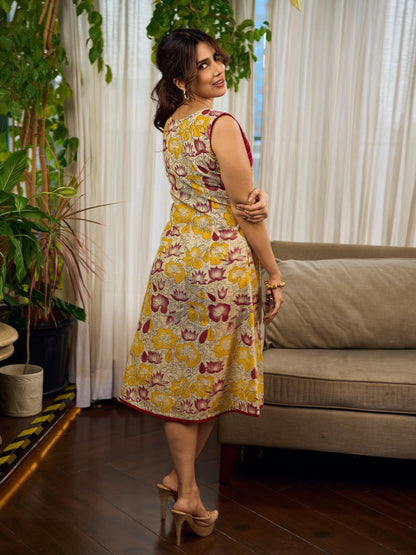 Elegant cream and maroon Madhubani dress featuring sophisticated wavy pintuck flap detailing.