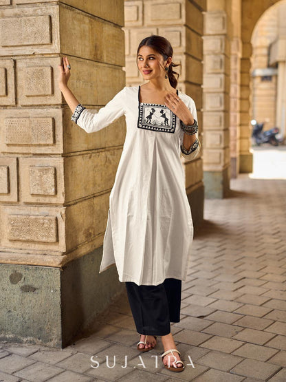 Timeless Off-White Cotton Kurta Featuring Hand Painted Warli Folk Art Yoke & Cuff Band