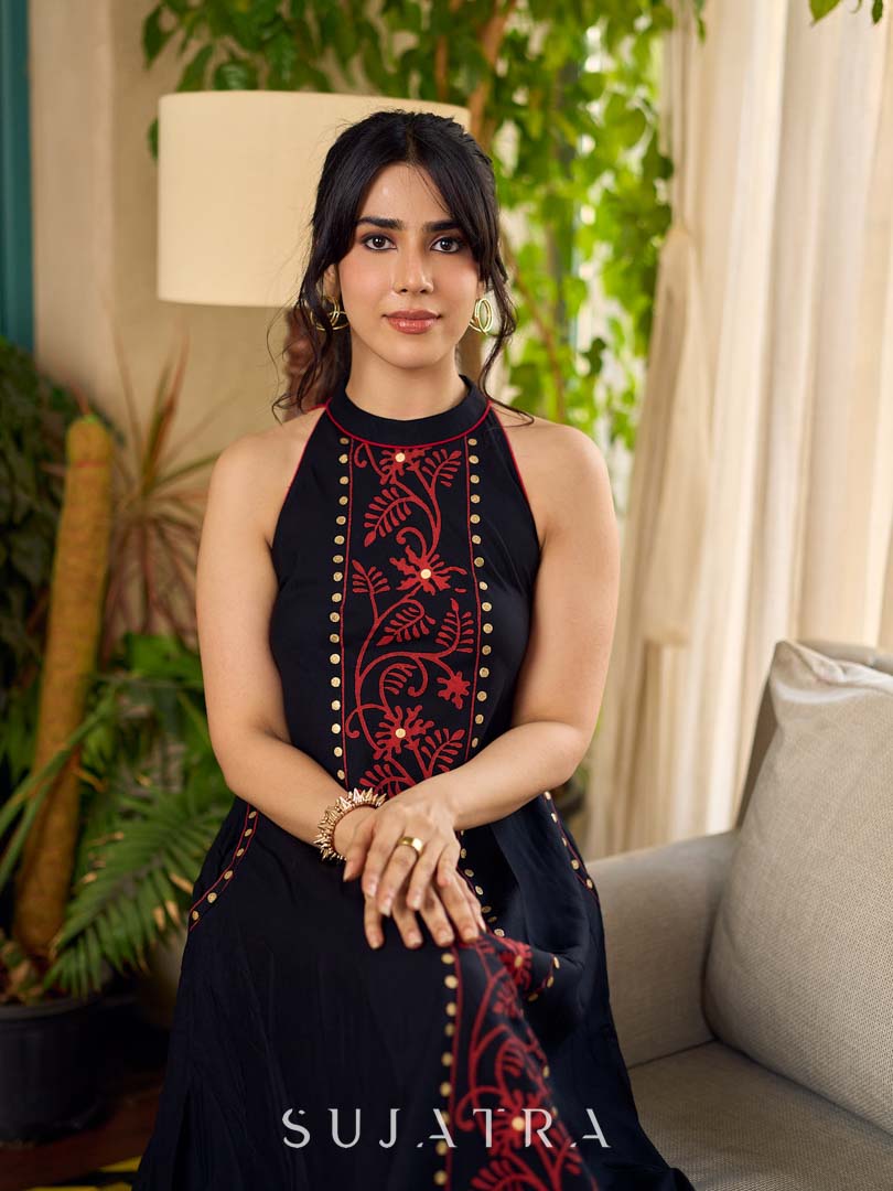 Black bias-cut block print halter dress with a red jaal hand block printed front panel, golden print detailing, and red accents for a striking, elegant statement look.