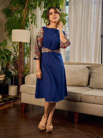 Navy Blue Artisanal Kalamkari prints enhanced with statement sleeves and a waist-defining knotted Kalamkari belt.