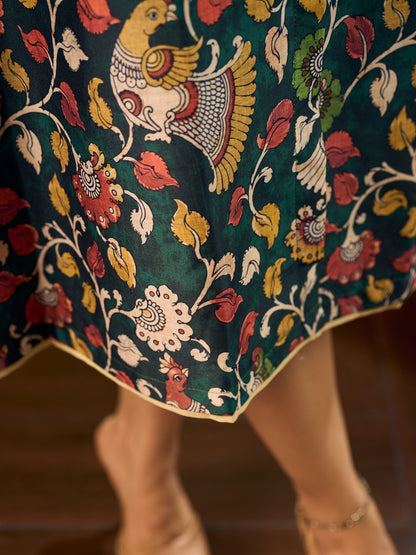 Classic bottle green Kalamkari printed dress with a beige elegant pintuck detailing.