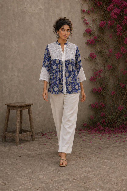 Blue floral Jaipur-printed top with statement hakoba panels and delicate white lace accents.
