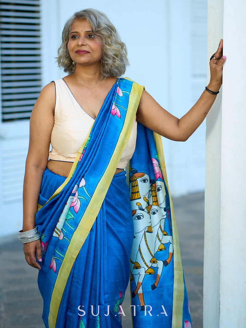 Vibrant Blue Silk Saree with Pichwai Motifs and Floral Border