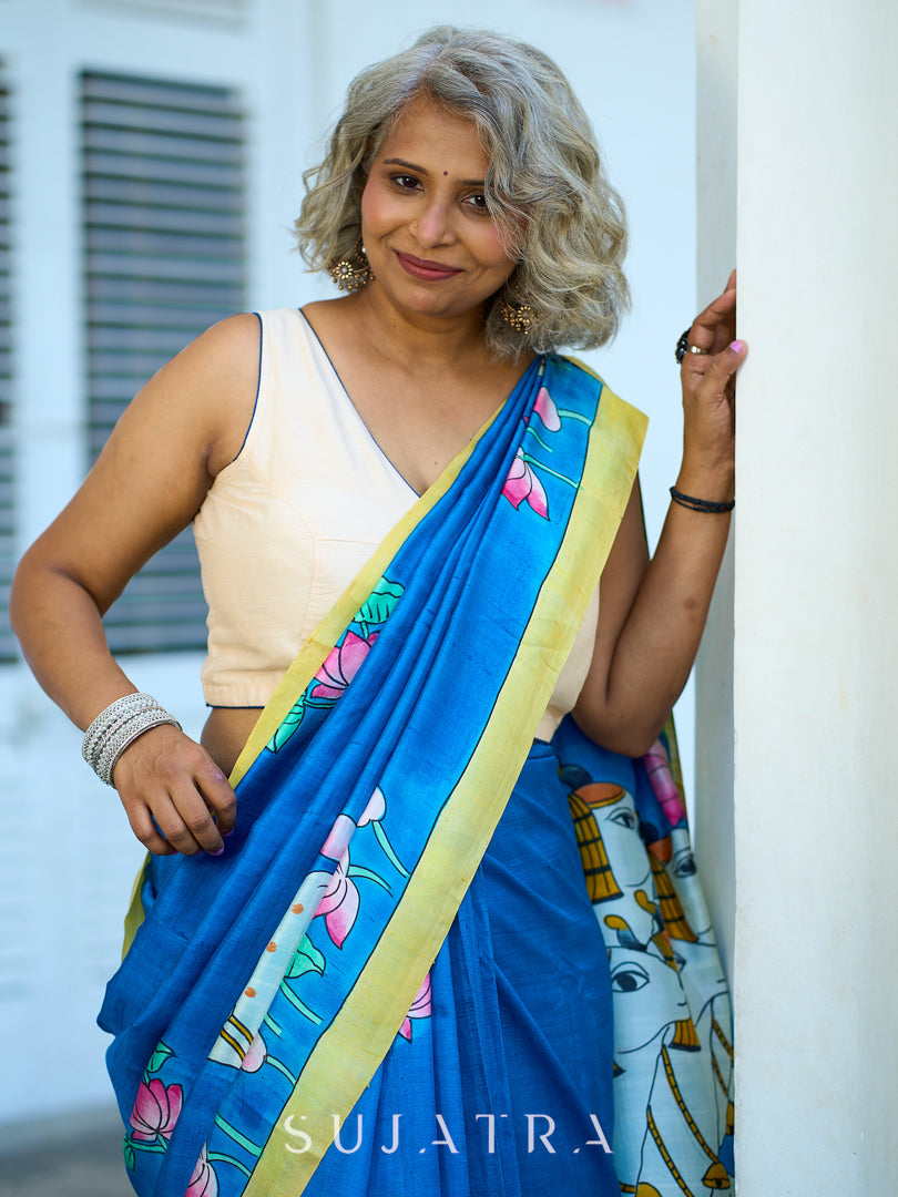 Vibrant Blue Silk Saree with Pichwai Motifs and Floral Border