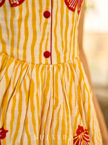 Yellow and white zebra-striped hand block printed sleeveless vintage luxe dress with maroon bird motifs and matching accents for a bold, elegant statement look.