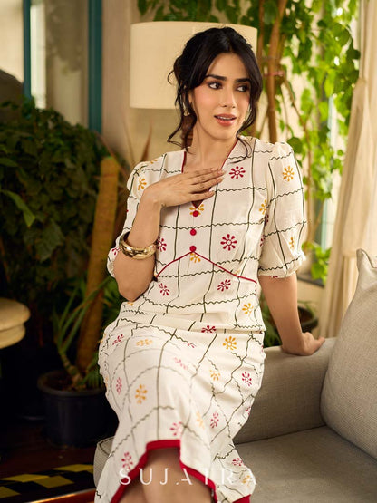 Soft off-white block printed rayon dress with intricate all-over hand block printed checks and florals, a gently gathered yoke, and rich red accents for a refined, elegant everyday look.