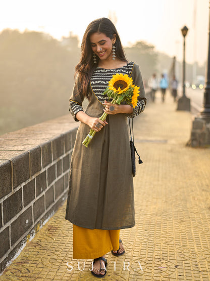 Stylish Grey Cotton Pleated Kurta with Artful Printed Yoke, Cuff Design & Contrast Mustard Piping