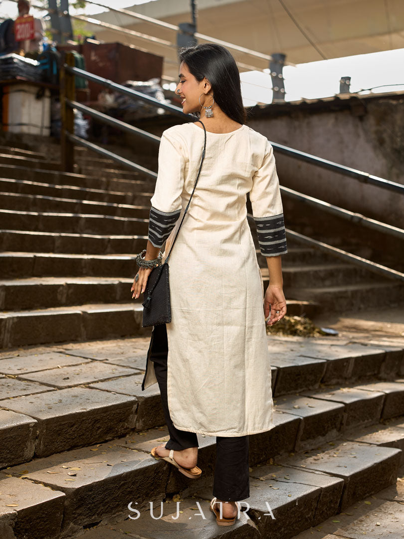 Elegant Off-White Cotton Flex Kurti with Ikat Hem & Sleeve Accents