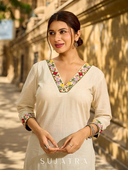 Classic Off-White Straight Cotton Kurta Featuring Vibrant Floral Hand Embroidery on Neckline & Sleeve Cuffs