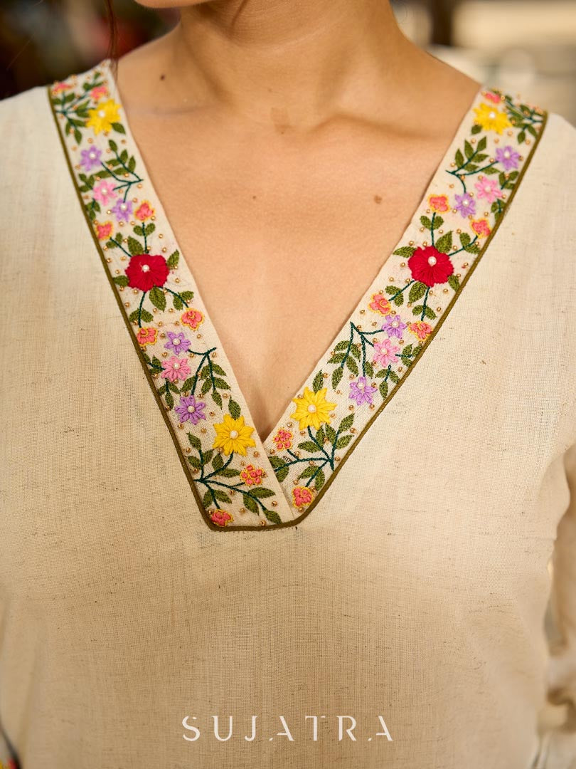 Classic Off-White Straight Cotton Kurta Featuring Vibrant Floral Hand Embroidery on Neckline & Sleeve Cuffs