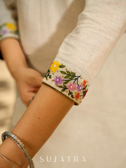 Classic Off-White Straight Cotton Kurta Featuring Vibrant Floral Hand Embroidery on Neckline & Sleeve Cuffs