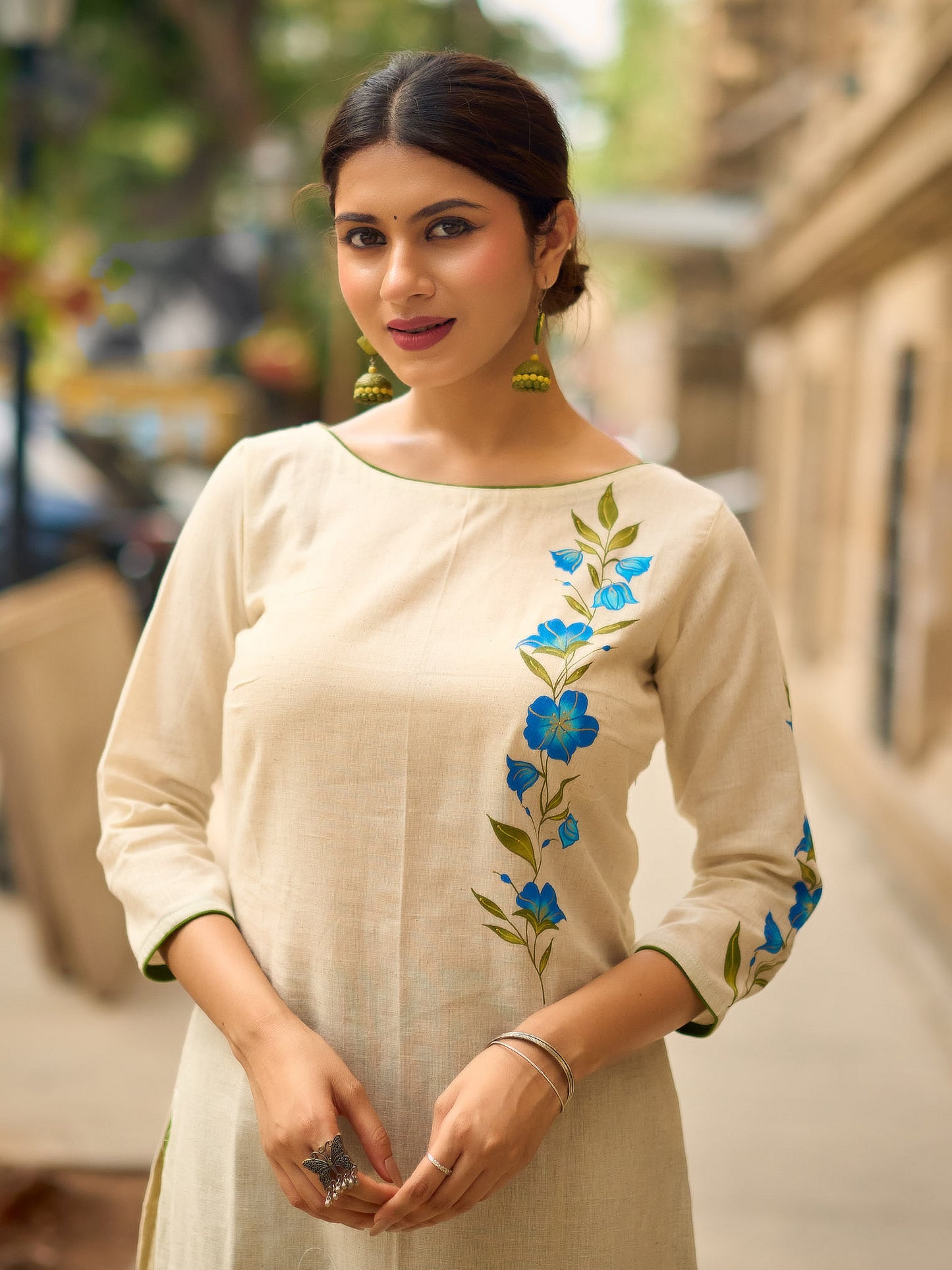 Serene Off-White Cotton Flex Kurta with Artistic Hand Painted Blue Floral Motif & Simple Silhouette