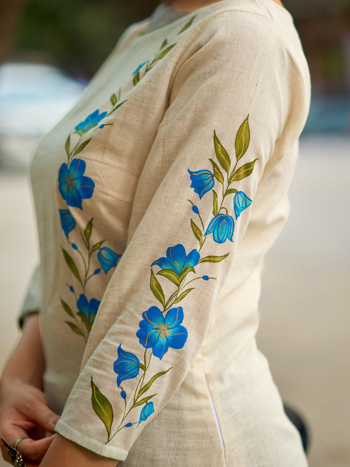 Serene Off-White Cotton Flex Kurta with Artistic Hand Painted Blue Floral Motif & Simple Silhouette - Pant Optional