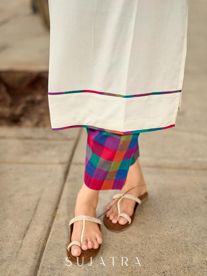 Pristine Off-White Sleeveless Halter Neck Kurta with Vibrant Multicolor Buttons & Hem Trim