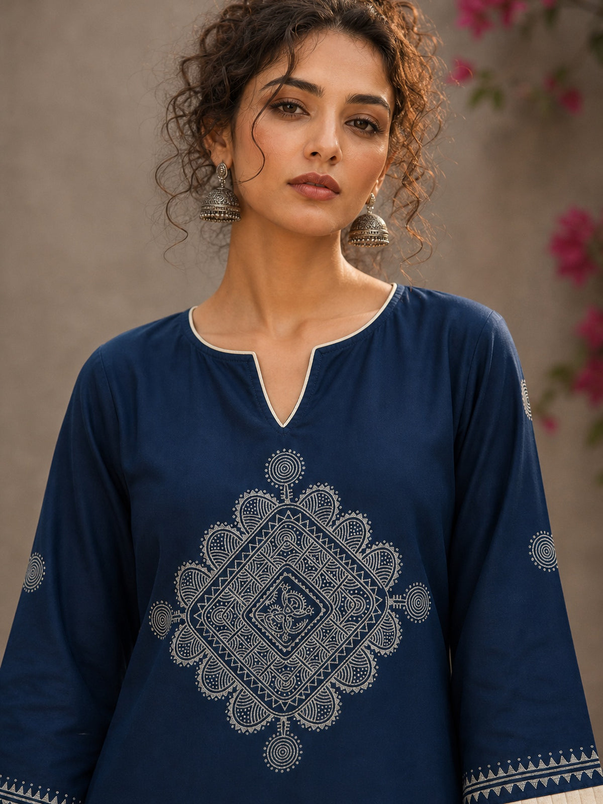 Captivating navy top adorned with a bold, rhythmic block print design, pleated sleeve detailing, and a versatile cut. - Pant Optional