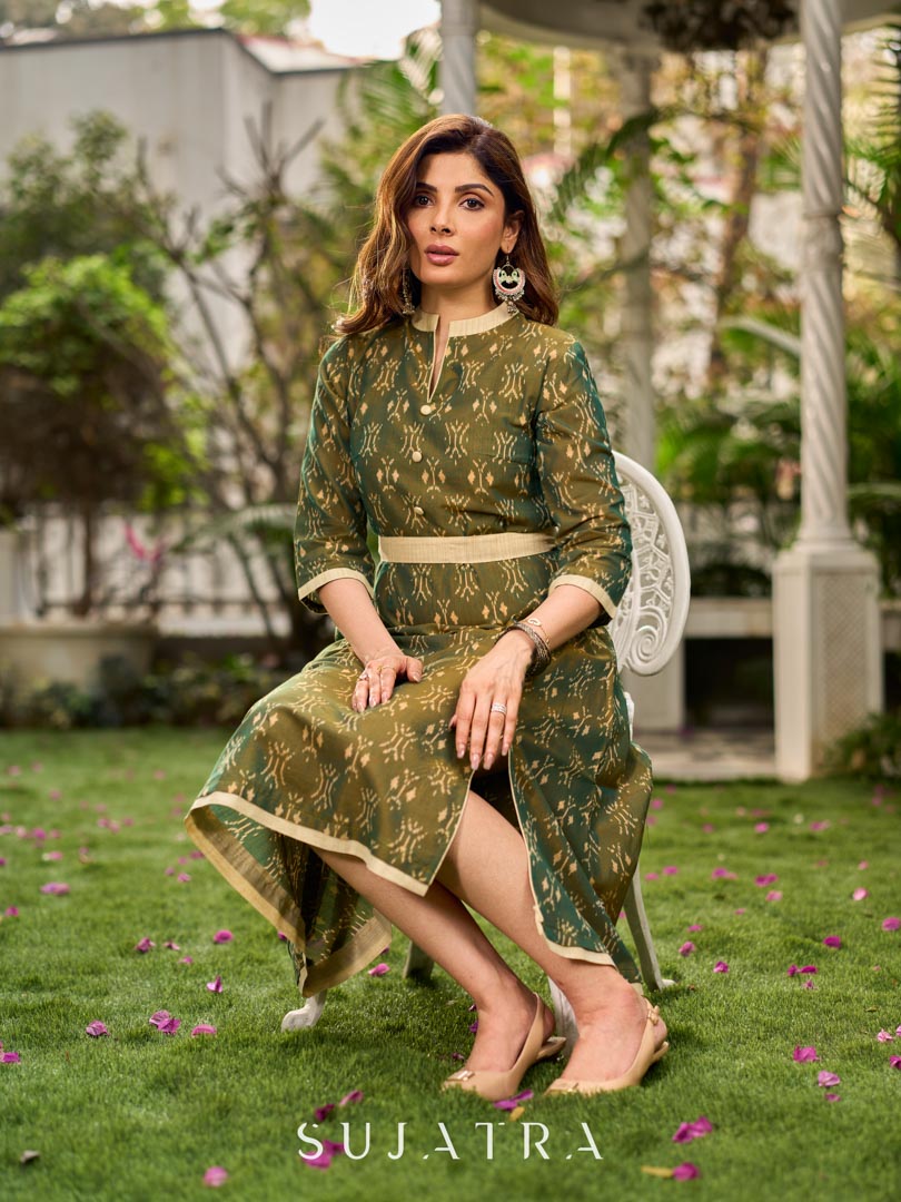 Statement olive green two-tone Ikat dress elevated with cream and gold accents, a structured belt for definition, and a subtle left-front slit.