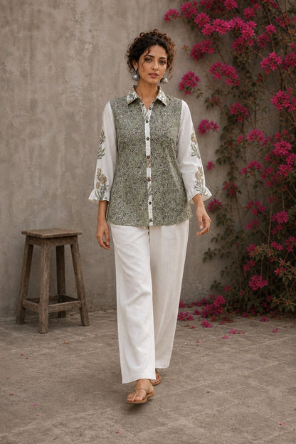 Off-white cotton shirt with pastel green Jaipur jaal print body and contrasting motif-printed sleeves.